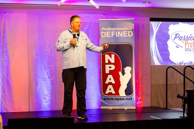 Erig Naig on stage at the NPAA conference.