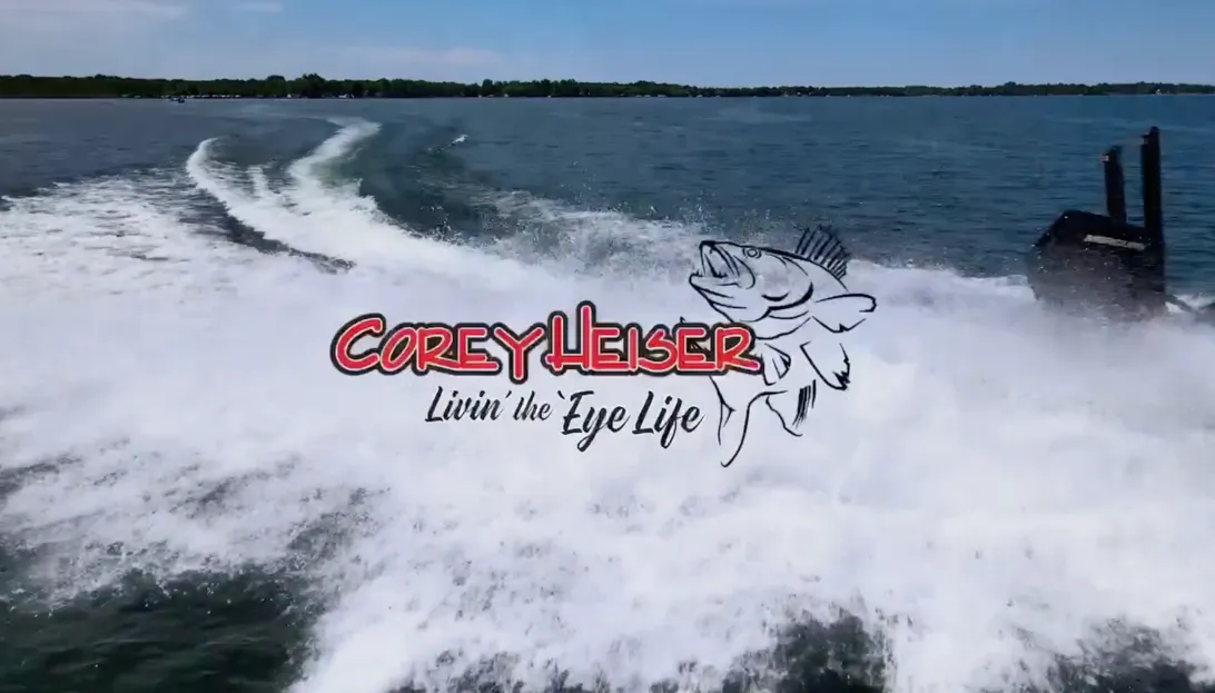 The Corey Heiser "Livin' the 'Eye Life" logo displayed over a trail of white water from the back of a boat.